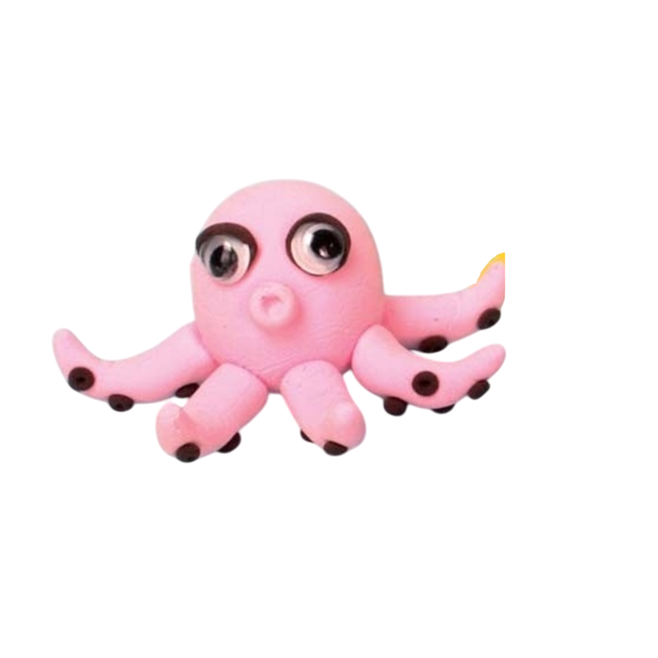 Enfant modelant une figurine Poulpette avec la pâte Créapito légère. Canocea France