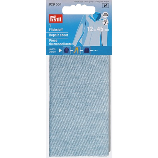 Patch thermocollant Prym bleu ciel, format 12x45 cm, en coton épais avec couche adhésive. Présenté à plat sur fond neutre. canocea