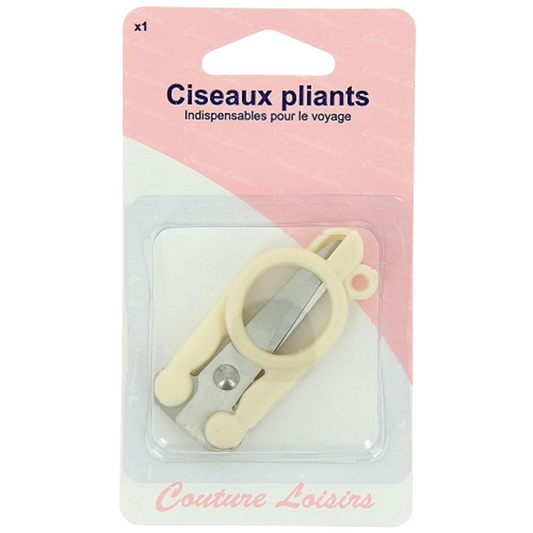 Ciseaux pliants 10 cm en acier inoxydable repliés dans une main - canocea