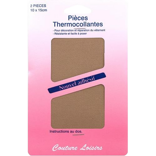 Deux pièces thermocollantes beige 10 x 15 cm en polyester posées sur un coussin en tissu synthétique. canocea